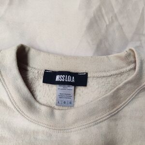 Miss Lola off Cream sweater